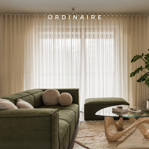 For a cozy and intimate feel, pairing a sofa with an ottoman or armchair helps create a warm, inviting atmosphere where conversation comes naturally