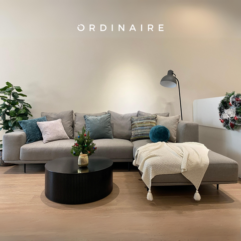 Decorate the sofa with colorful pillows and blankets